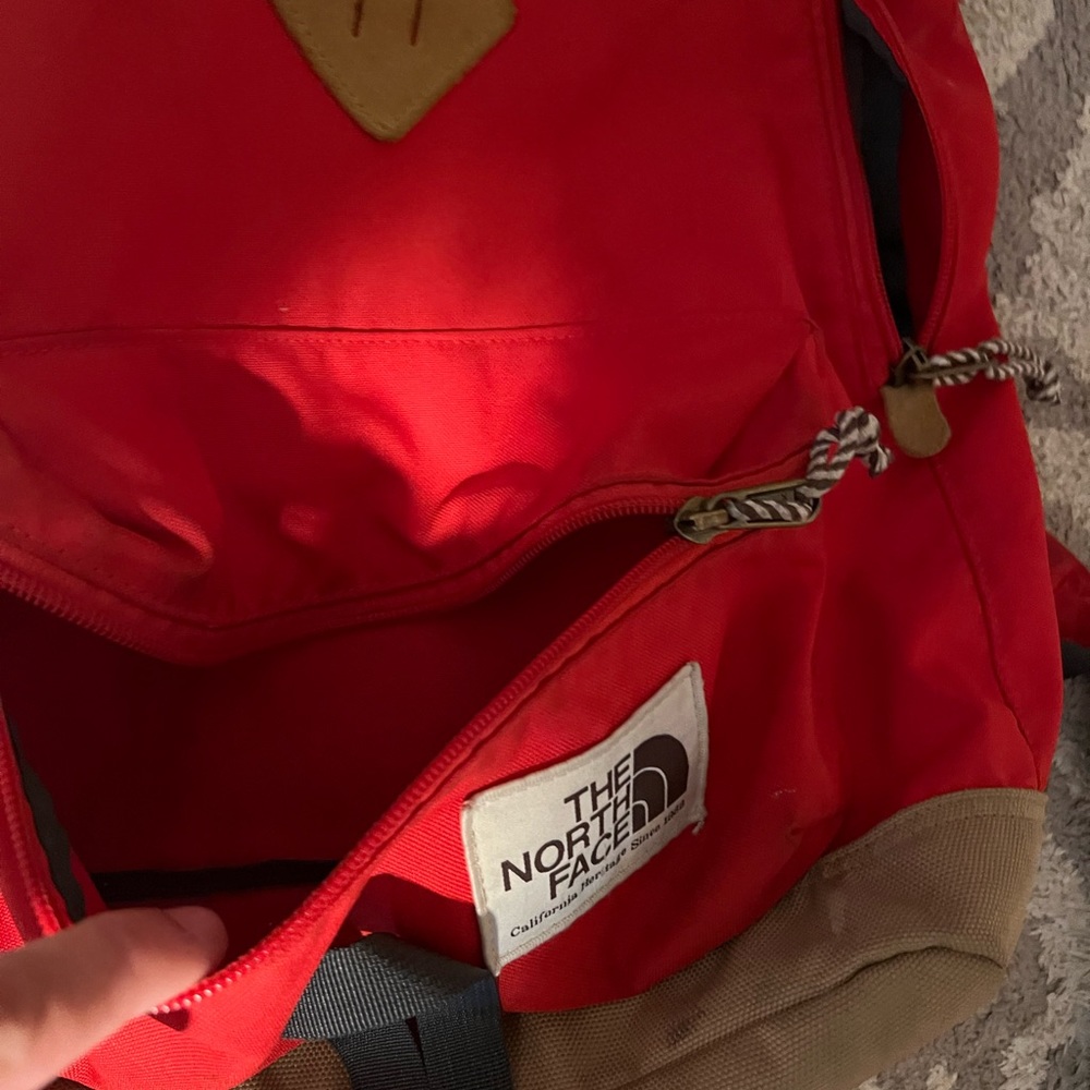 Small red north face backpack